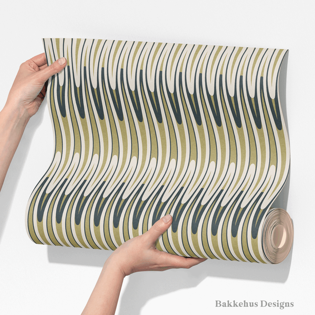 Two hands unroll a length of Retro Wavy Stripe wallpaper, showing the elongated olive green and charcoal waves running in vertical stripes on cream.