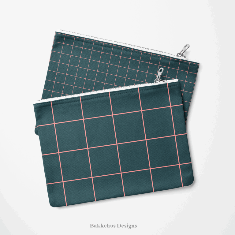 Two zip pouches made from Windowpane Check fabric, one lying on the other: a small pink grid on deep teal at the back and a larger one in front.